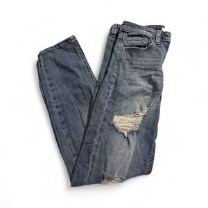 Woman’s Blue Distressed Jeans